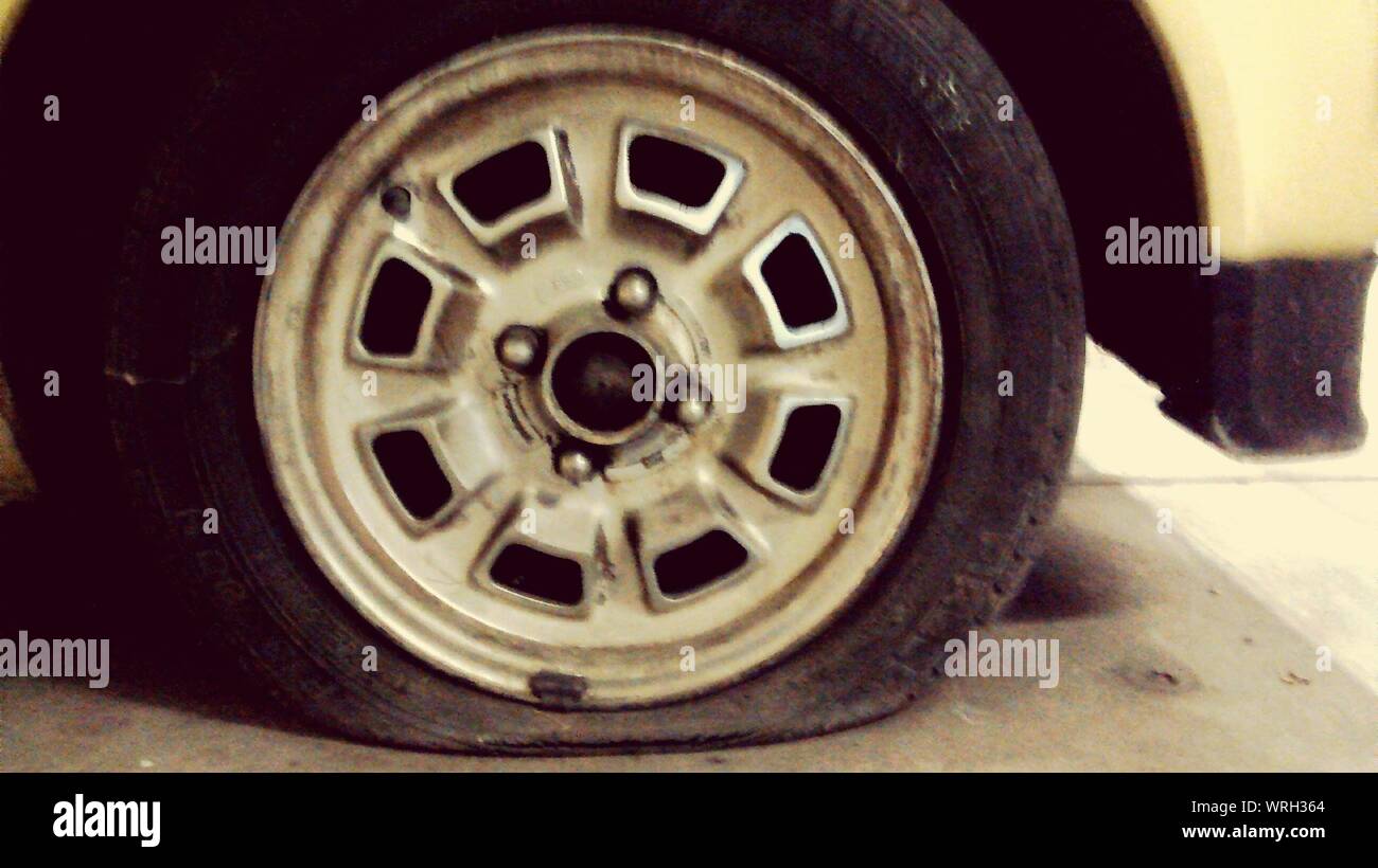 Flat tire car hires stock photography and images Alamy