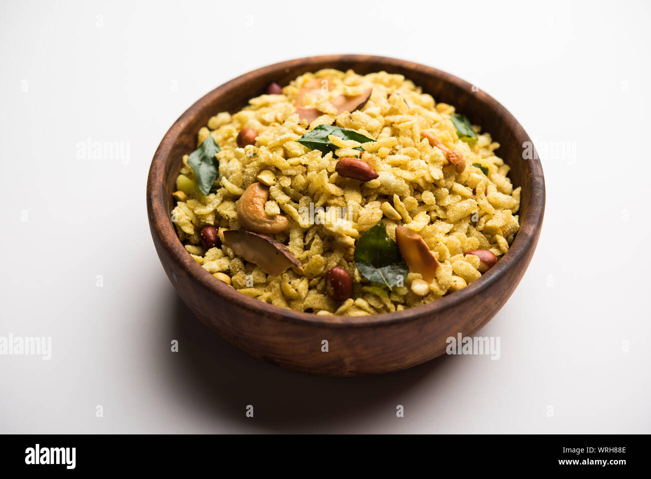 Chevda Tea Jada Poha Namkeen Chivda / Thick Pohe Chiwda is a jar snack with a mix ...