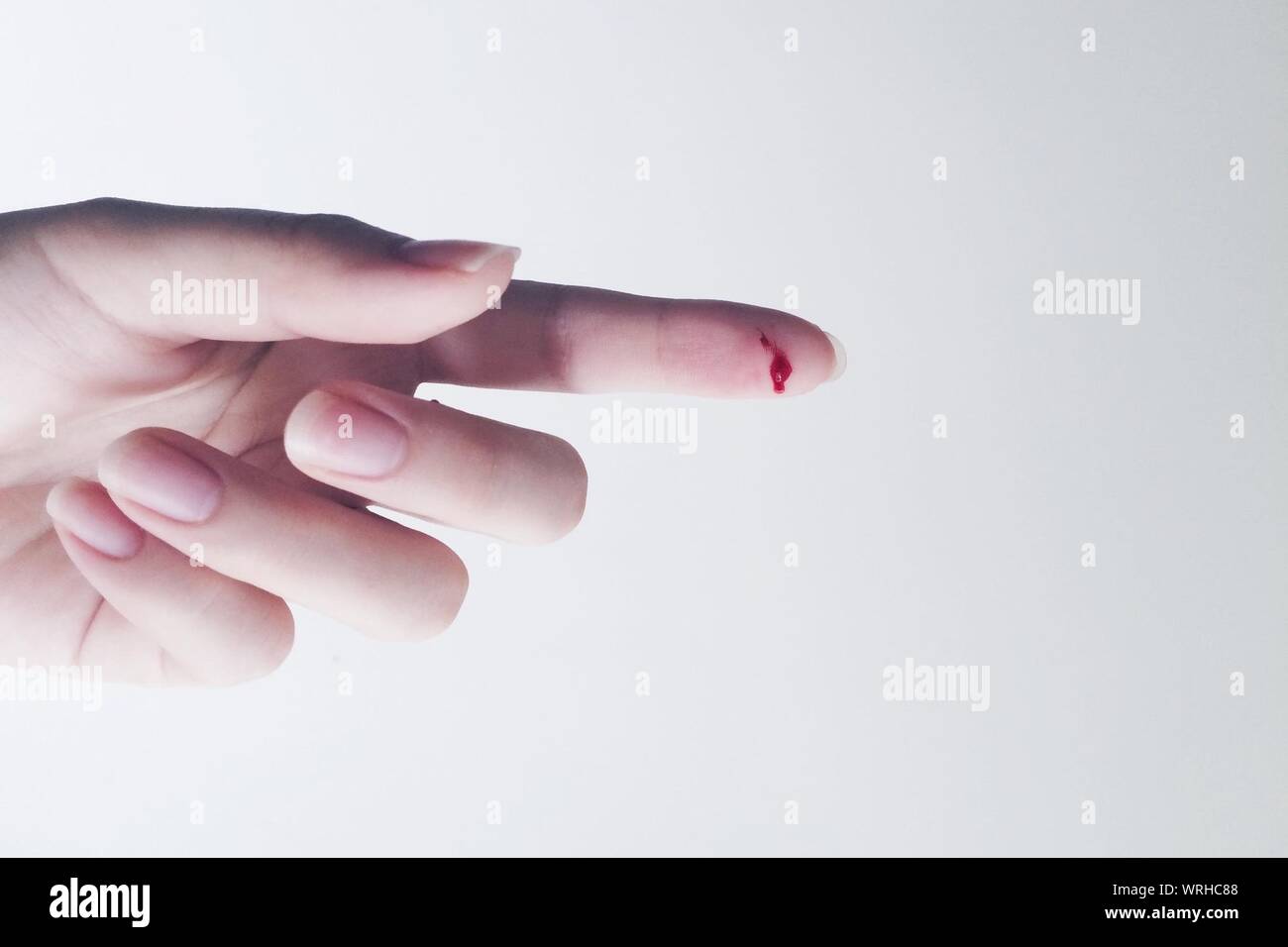 Bleeding cut finger hires stock photography and images Alamy
