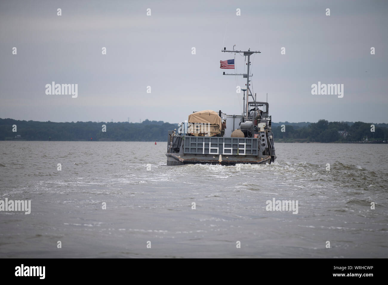 U.S. Marines and Sailors transport vehicles on the Potomac during Capital Shield 19, at Indian Head, Md., Sep 5, 2019. Capital Shield is an exercise to train and prepare emergency responders in the National Capital Region for chemical exposure and response. (U.S. Marine Corps photo by Lance Cpl. Sarah N. Petrock) Stock Photo