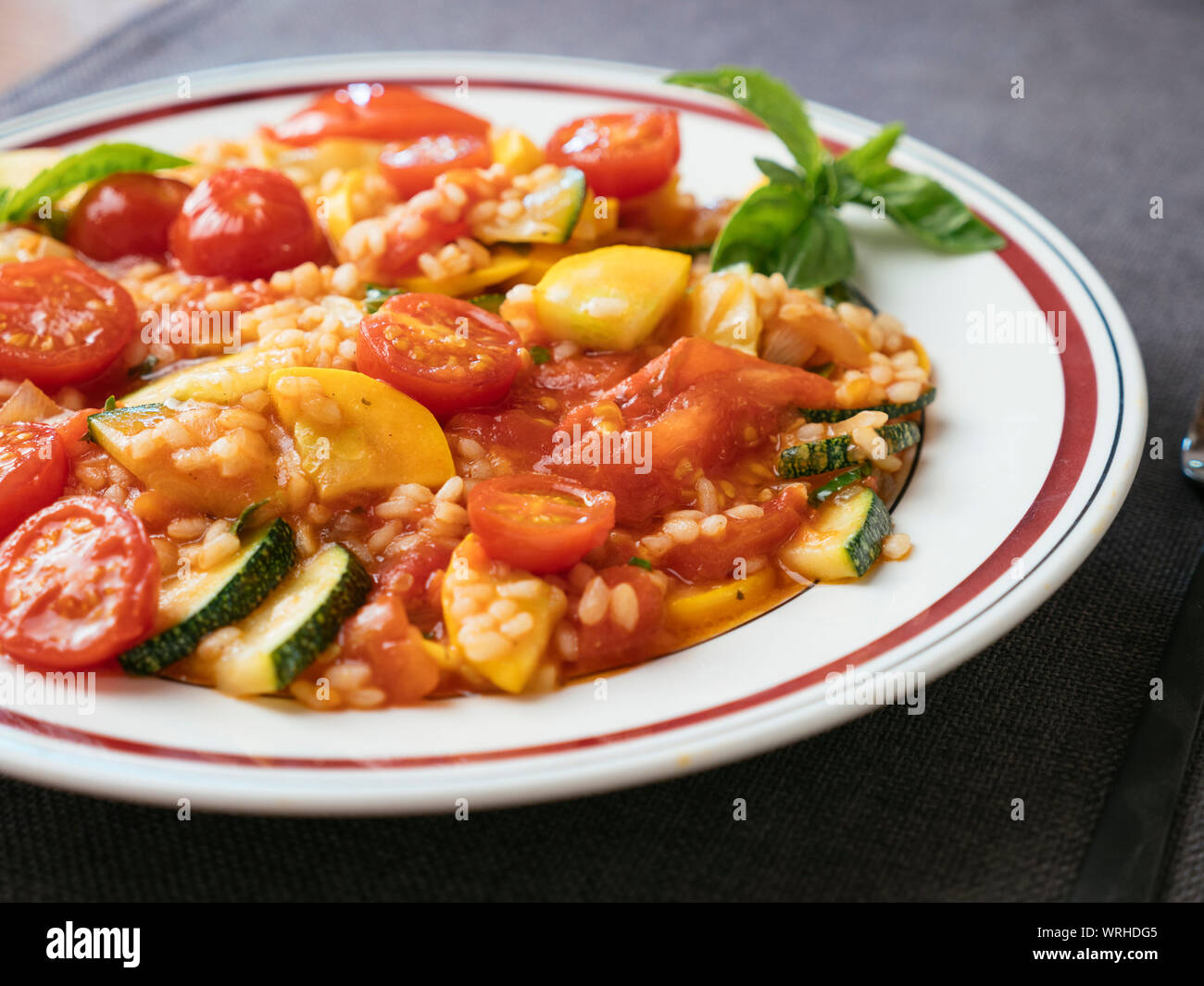 Zucchini, Tomato Risotto Stock Photo