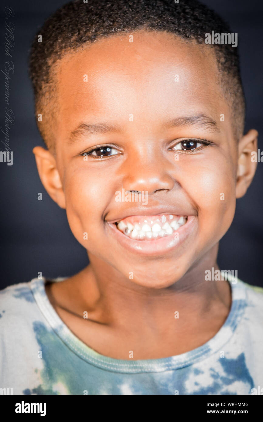 Black boy smiling hi-res stock photography and images - Alamy