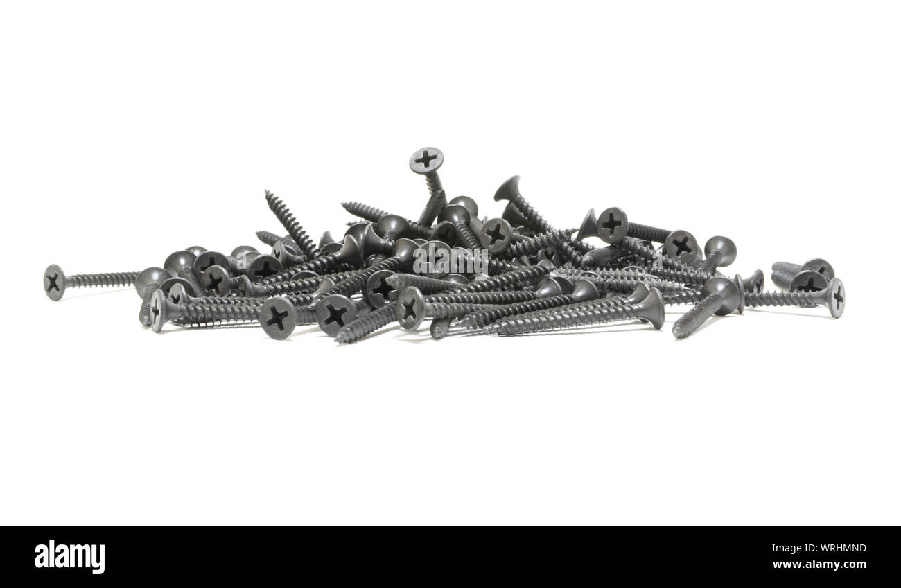 A pile of black screws. Isolated on white. Stock Photo