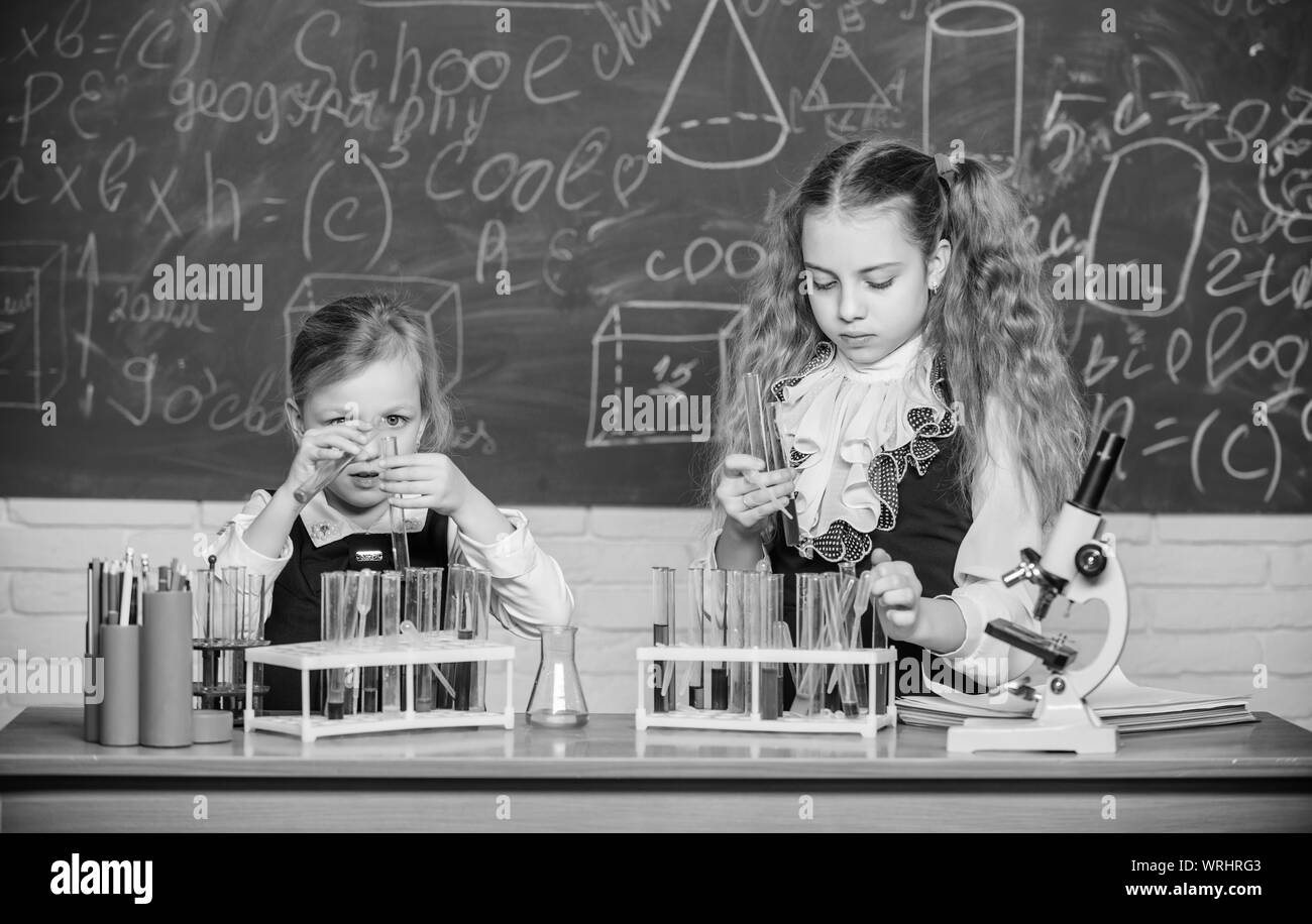 Improving their study skills. Study group in chemistry laboratory