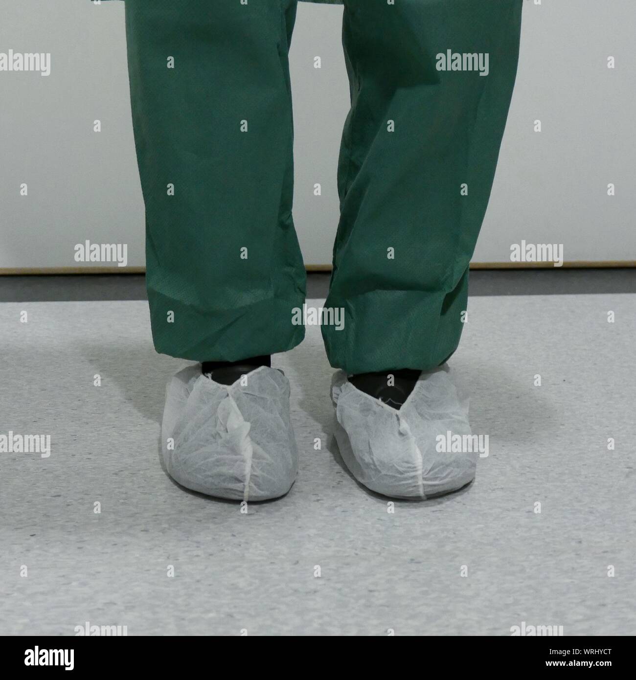 Hospital Surgeon Wearing Shoe Protectors Stock Photo