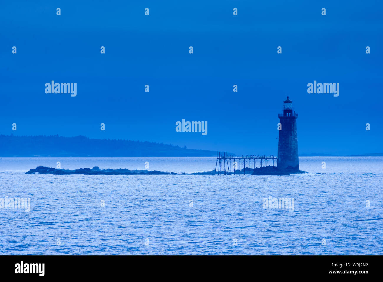 Ram Island Ledge Lighthouse on a n early blue morning, Portland, Maine, USA Stock Photo