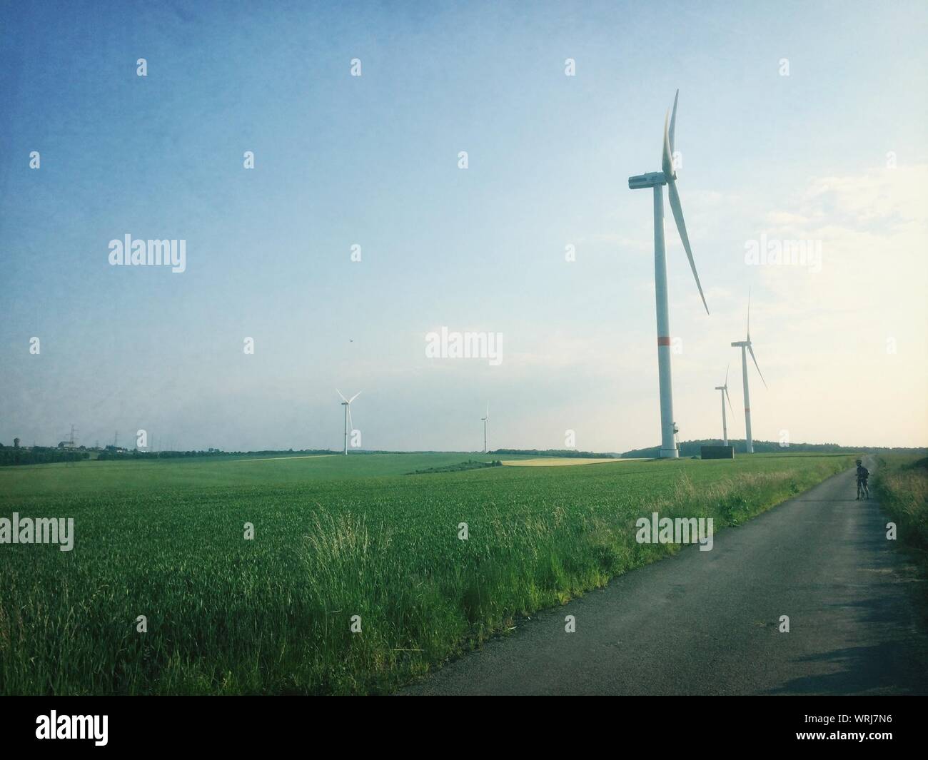 Empty road and wind turbine hi-res stock photography and images - Alamy