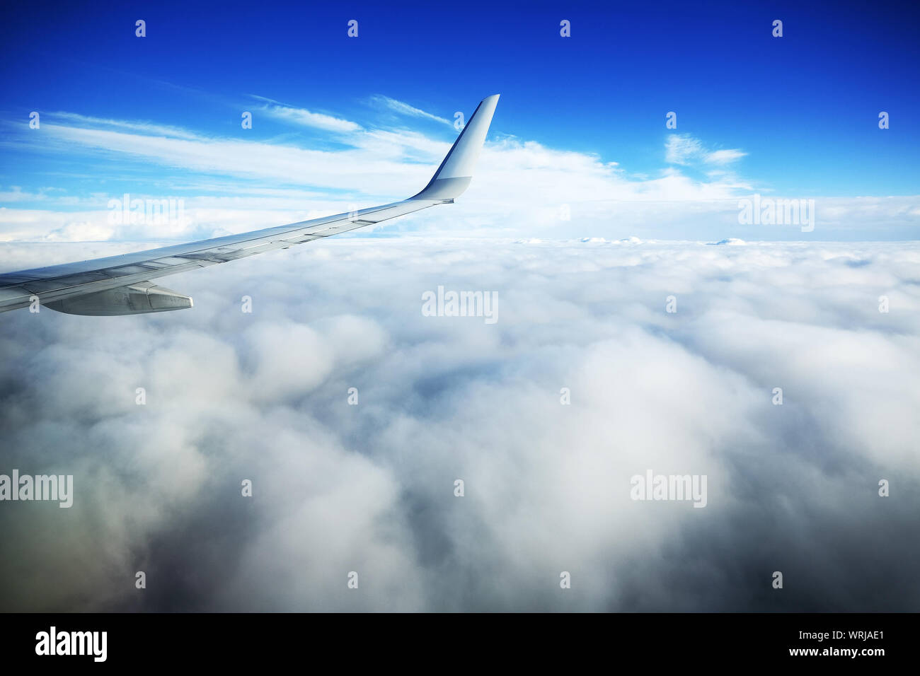 Airplane in sky clouds in hi-res stock photography and images - Alamy