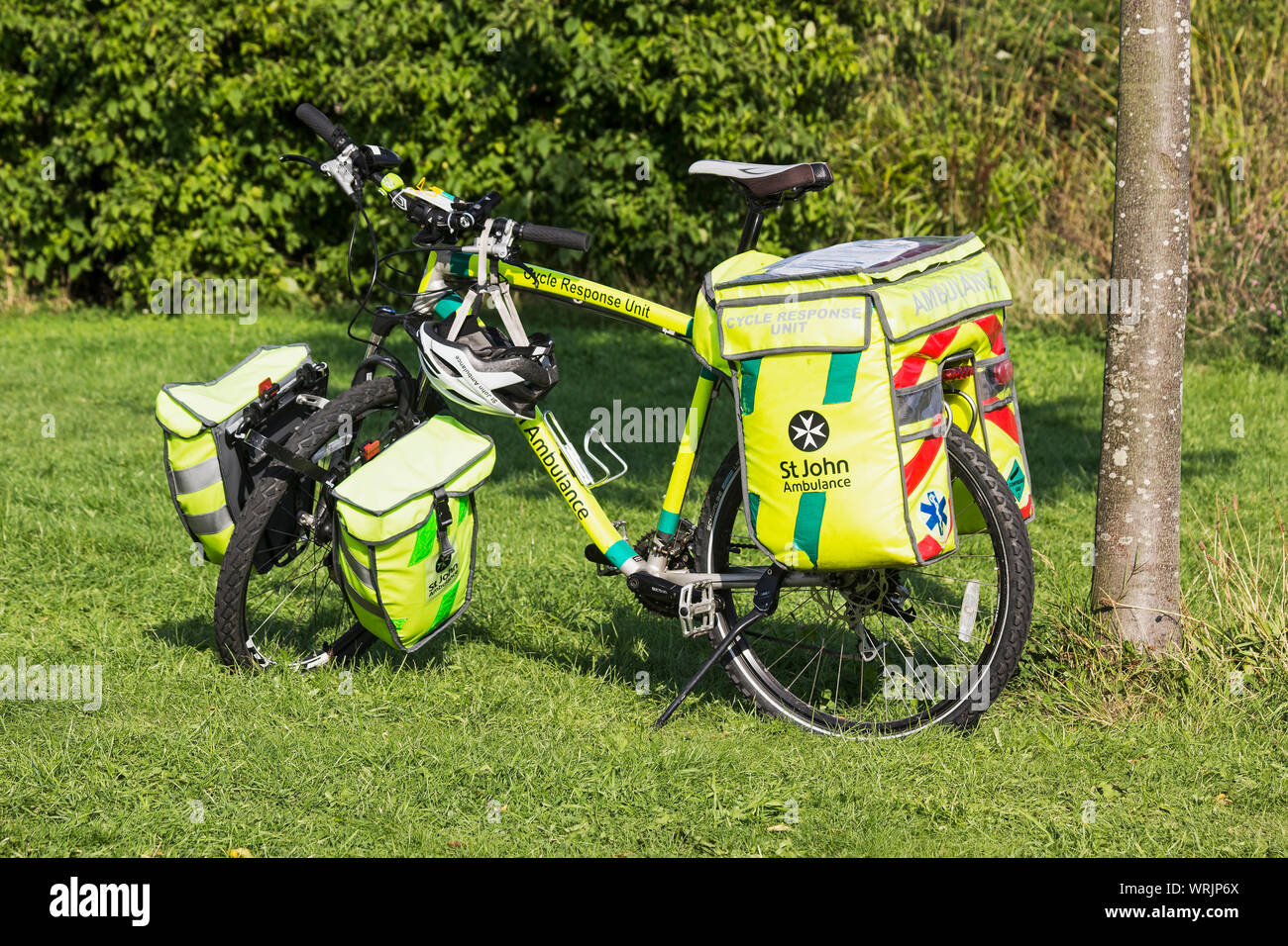 St John Ambulance push bicycle with panniers Stock Photo