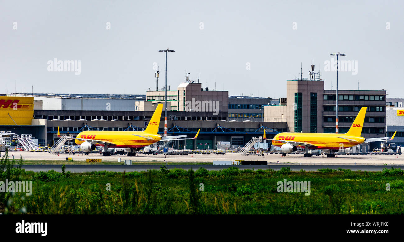 COLOGNE-BONN, NORTH RHINE-WESTPHALIA, AIRPORT, GERMANY - AUGUST 28, 2019 Two DHL machines at the freight terminal of Cologne Bonn Airport Stock Photo