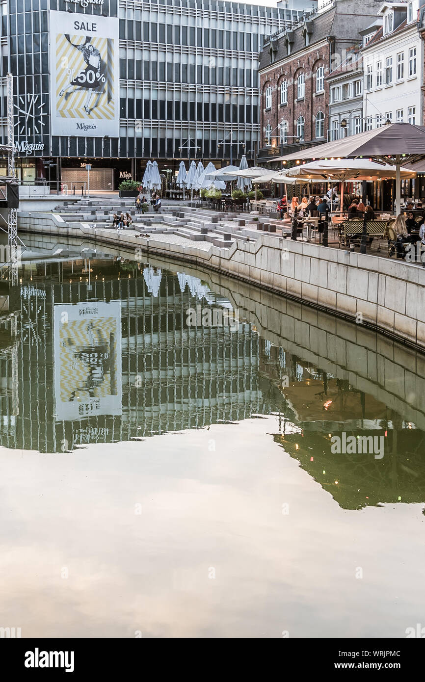 Aarhus city with space for text and a variety of restaurants and buildings reflecting in the canal, Denmark, July 15, 2019 Stock Photo