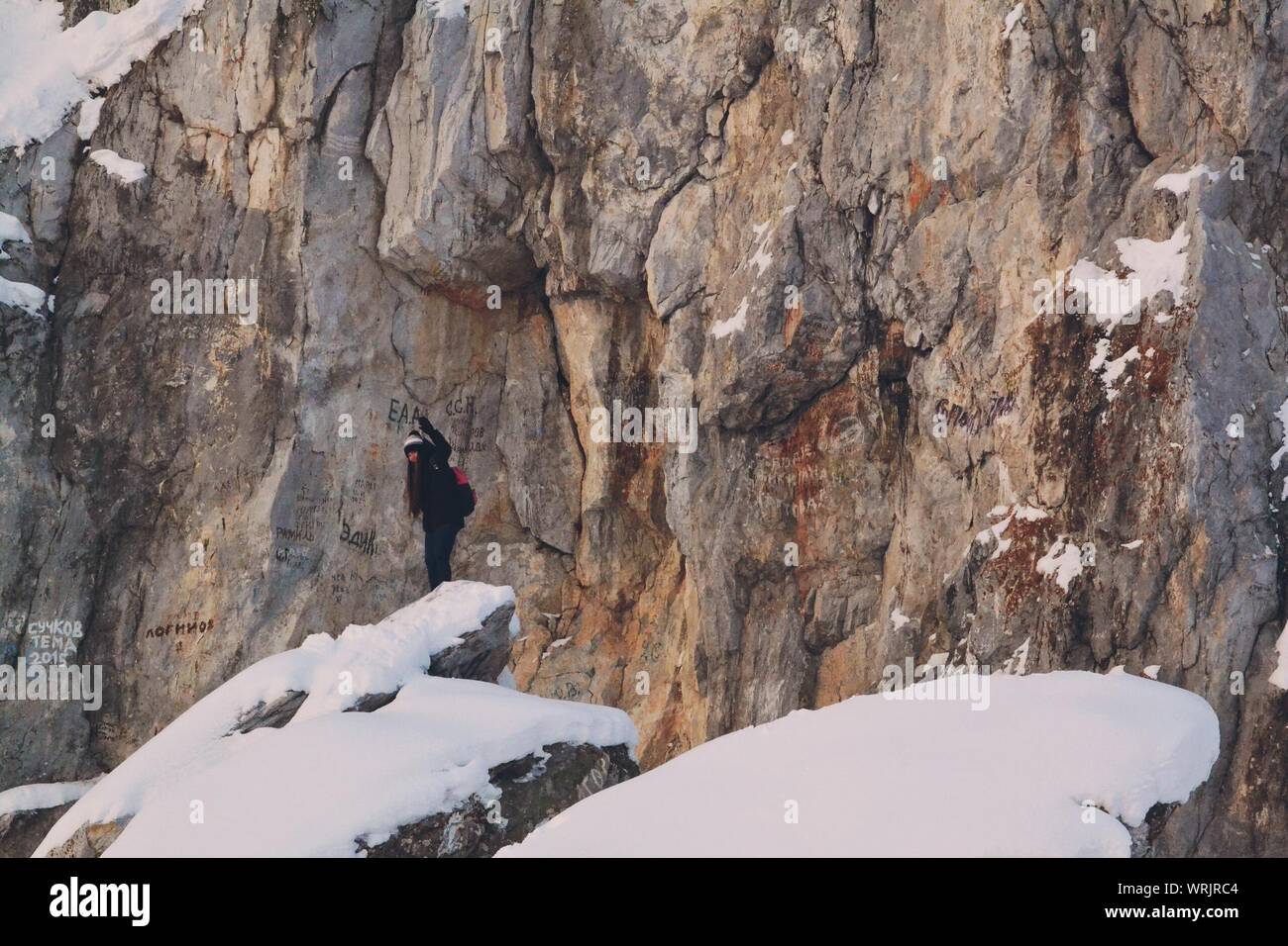 Woman Standing On Snowy Rock Stock Photo Alamy Woman Standing On Snowy Rock Stock Photo Alamy