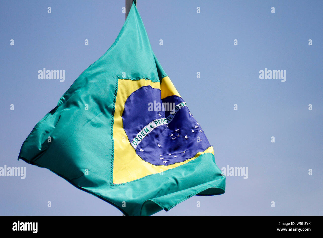 Brazilian flag in support and wind - National Pavilion - Brazilian Patria Symbol - Brazilian flag fluttering from a flag pole Stock Photo