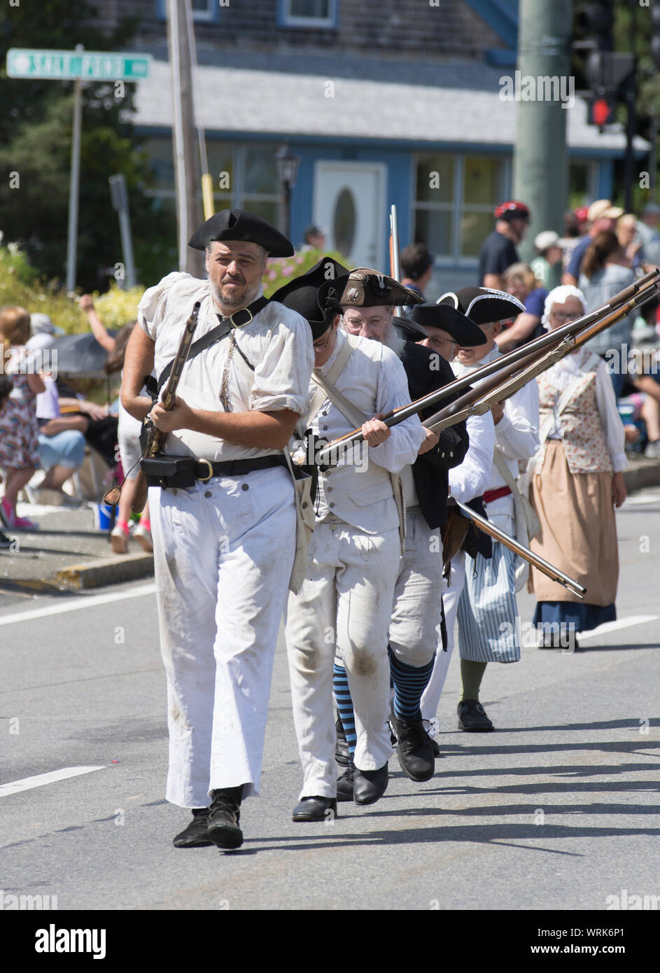 Marchers in a small  town parade in Eastham, Massachusetts on Cape Cod, USA.  Eastham Windmill Days Stock Photo