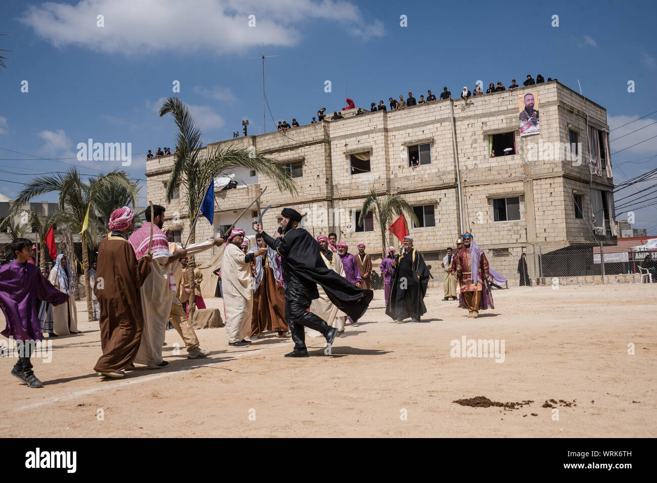 People in Jibchit, Nabatiyeh municipality, Lebanon, mourned the death of Imam Hussein, grandson of the Prophet Mohamed, through a reenactment of his death during the battle of Karbala in 680AD. A cast of 100 took part, complete with horses and a camel. Lebanon, 10th September 2019 Stock Photo