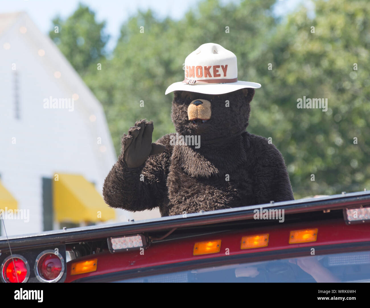 Smokey the Bear at a small  town parade in Eastham, Massachusetts on Cape Cod, USA.  Eastham Windmill Days Stock Photo