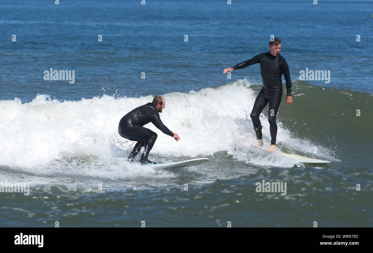 Surfing on Newcomb Hollow Beach, Wellfleet, Massachusetts on Cape Cod, USA Stock Photo