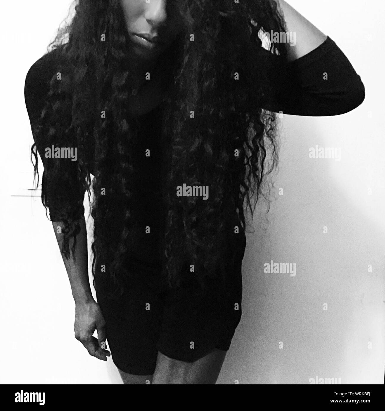 Woman with long curly hair hires stock photography and images Alamy
