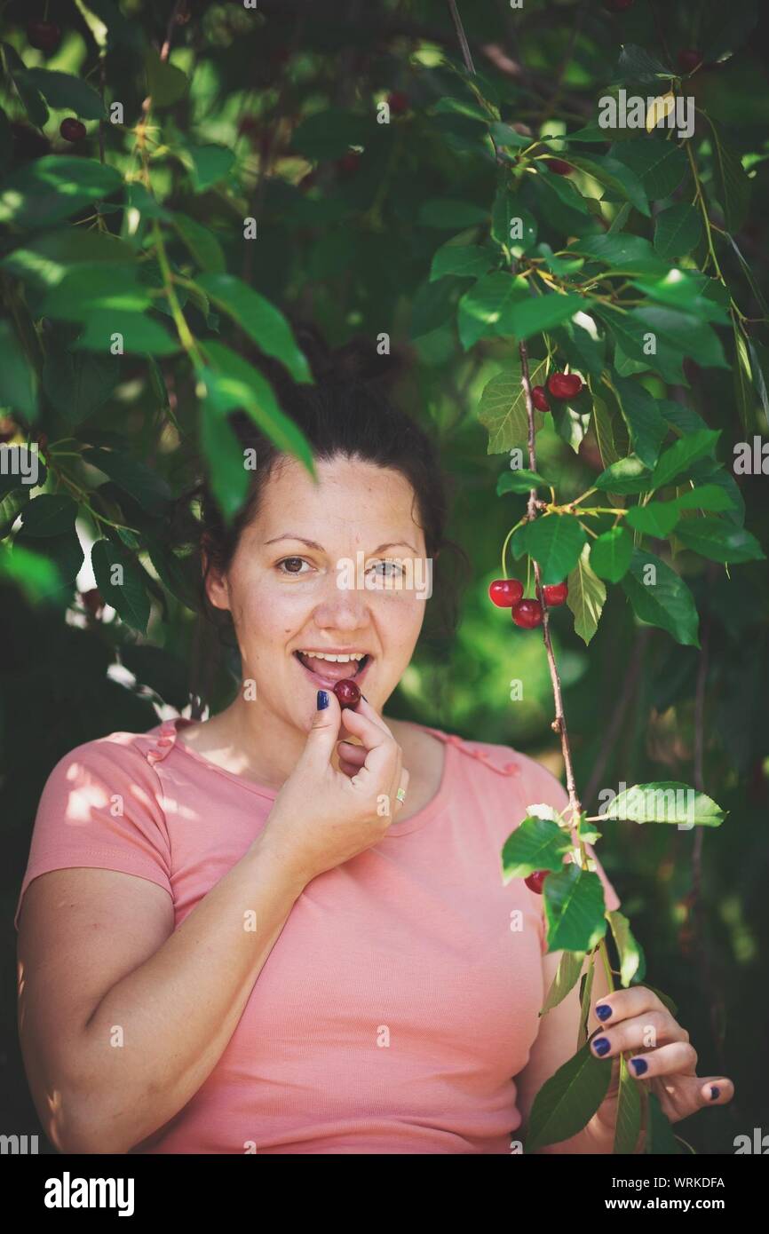Adult eating flower hires stock photography and images Alamy