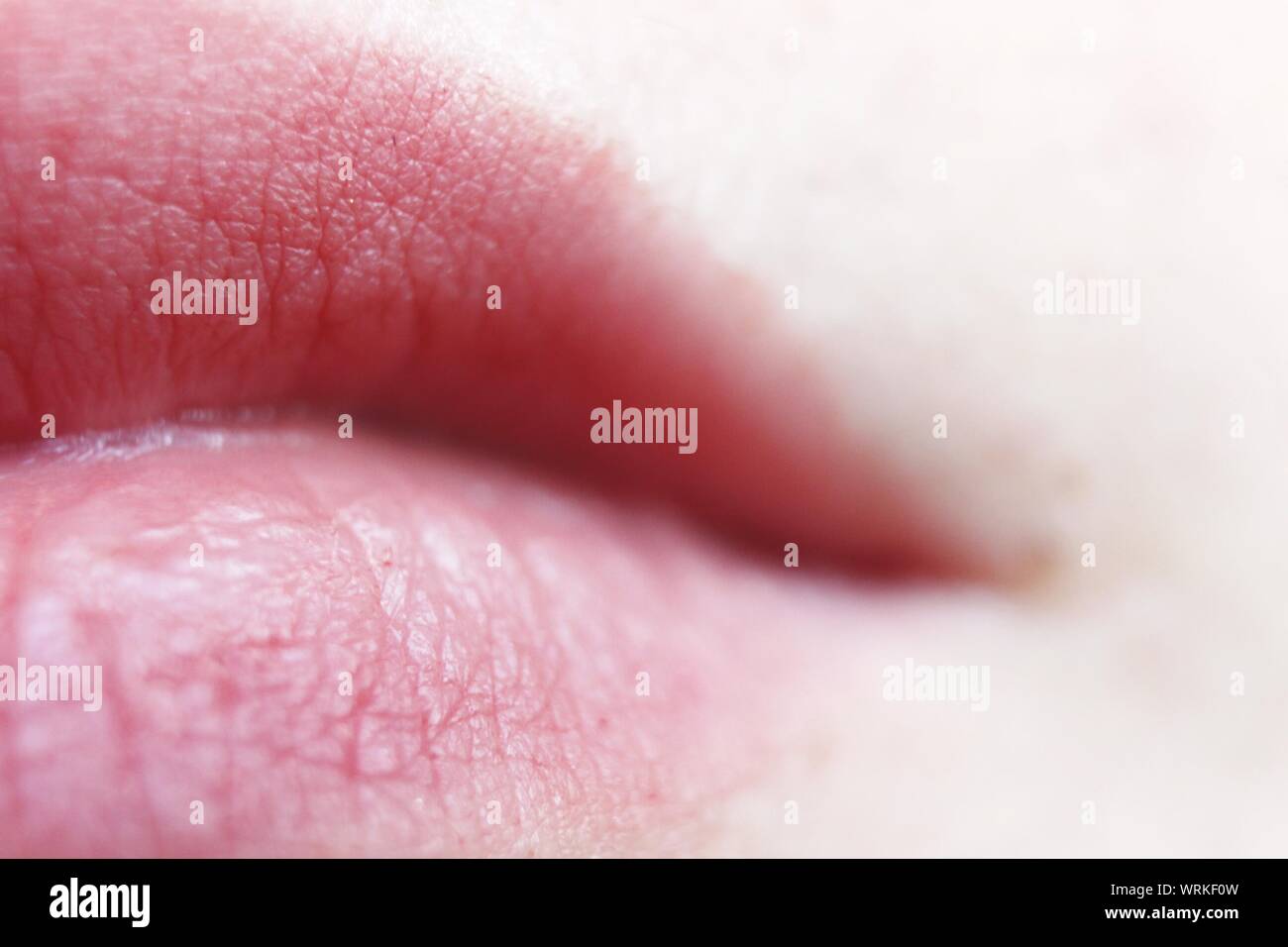 Close-up Of Human Lips Stock Photo