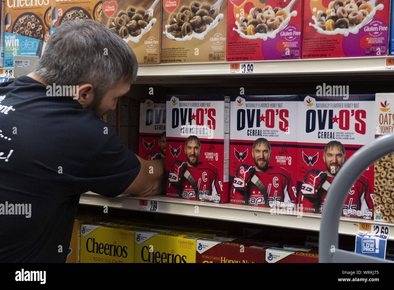 Washington Capitals captain Alexander Ovechkin stocks the shelves with his  own Ovi O's cereal at a Giant Supermarket in northwest Washington, DC on  Tuesday, September 10, 2019. Ovechkin helped launch the cereal