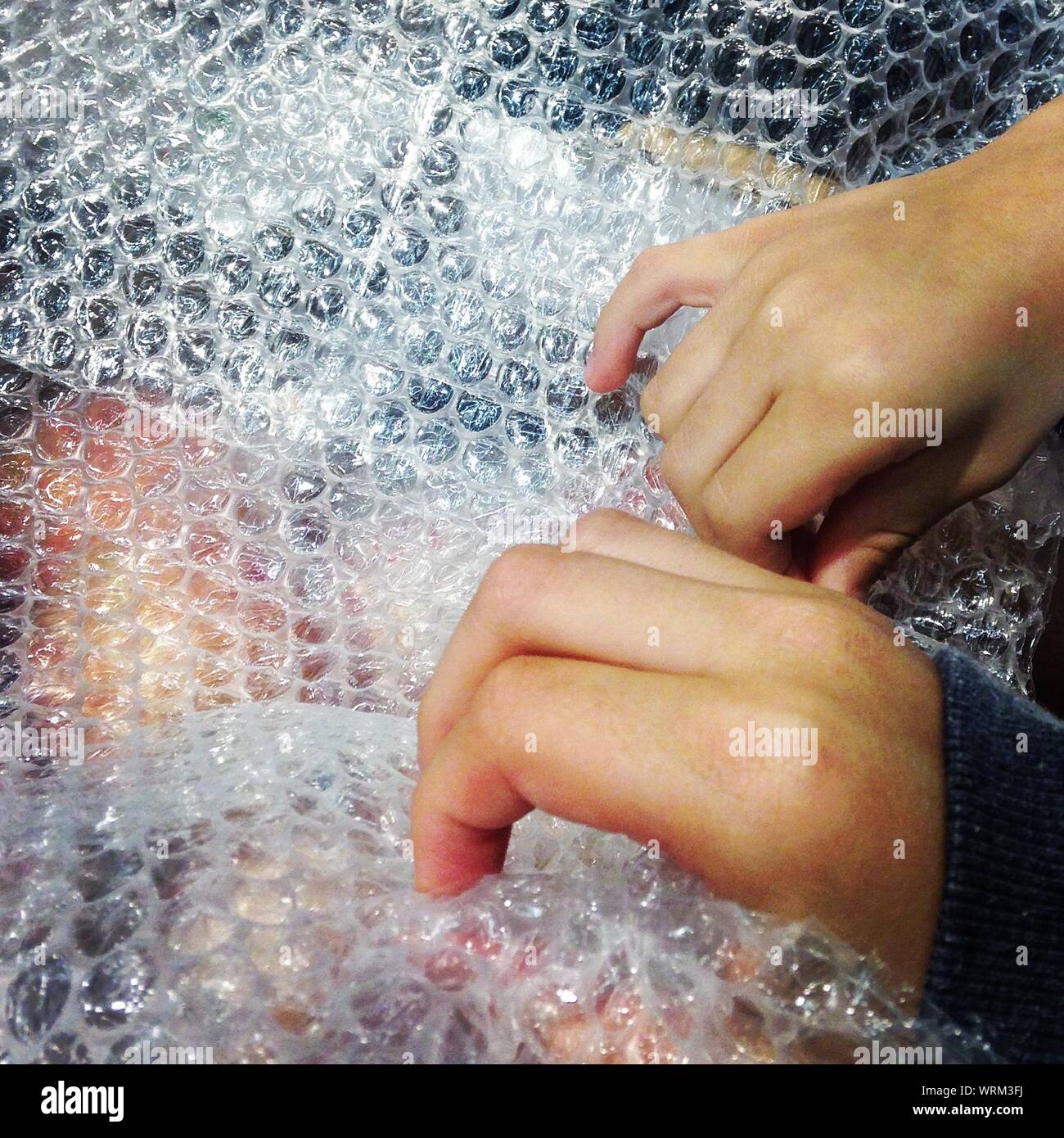Child Bubble Wrap High Resolution Stock Photography and Images Alamy