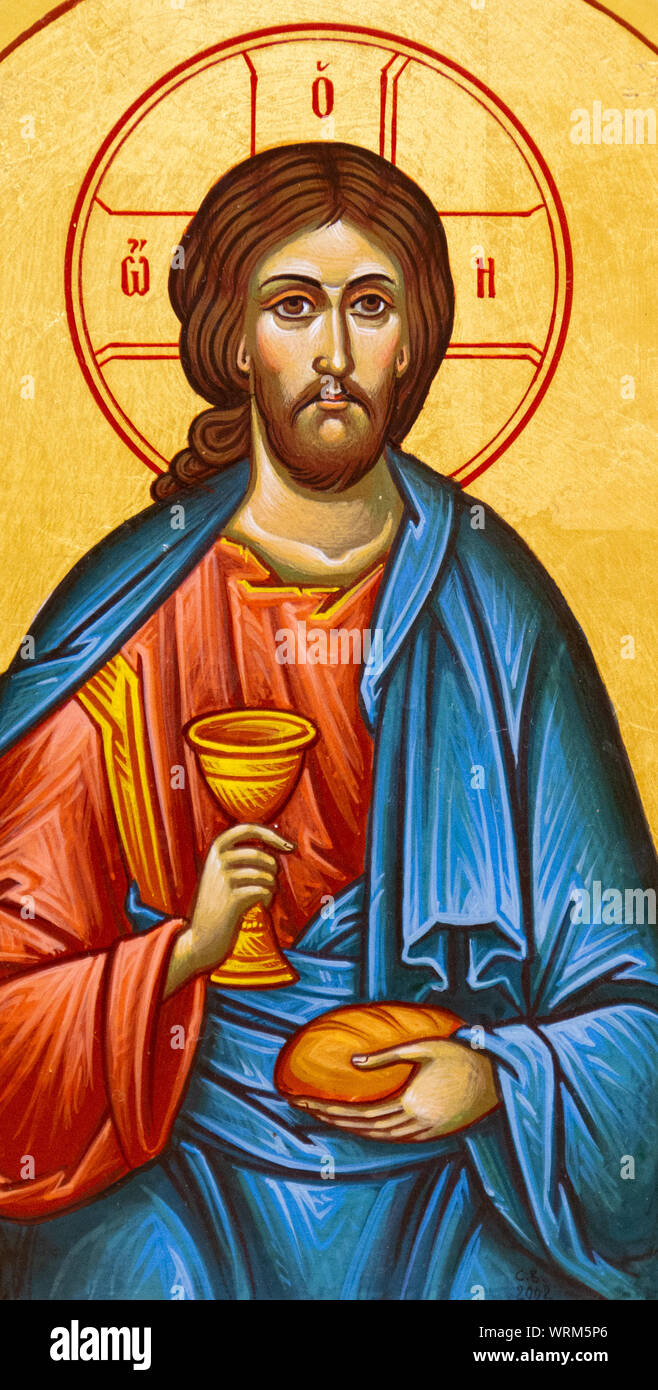 The icon of Jesus Christ with bread and wine in His hands. The icon is on the Eucharistic tabernacle. The Greek Catholic Church of Saint Elijah. Stock Photo