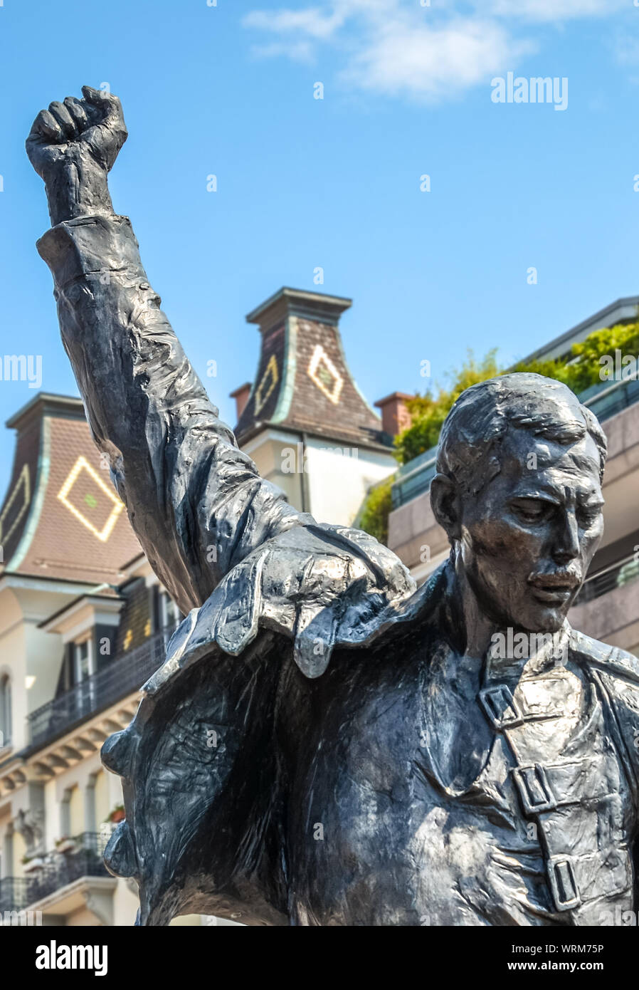 Montreux, Switzerland - July 26, 2019: Famous statue of Freddie Mercury, singer of the famous band Queen. Farrokh Bulsara, born in Zanzibar, Tanzania. The sculpture is a popular tourist landmark. Stock Photo