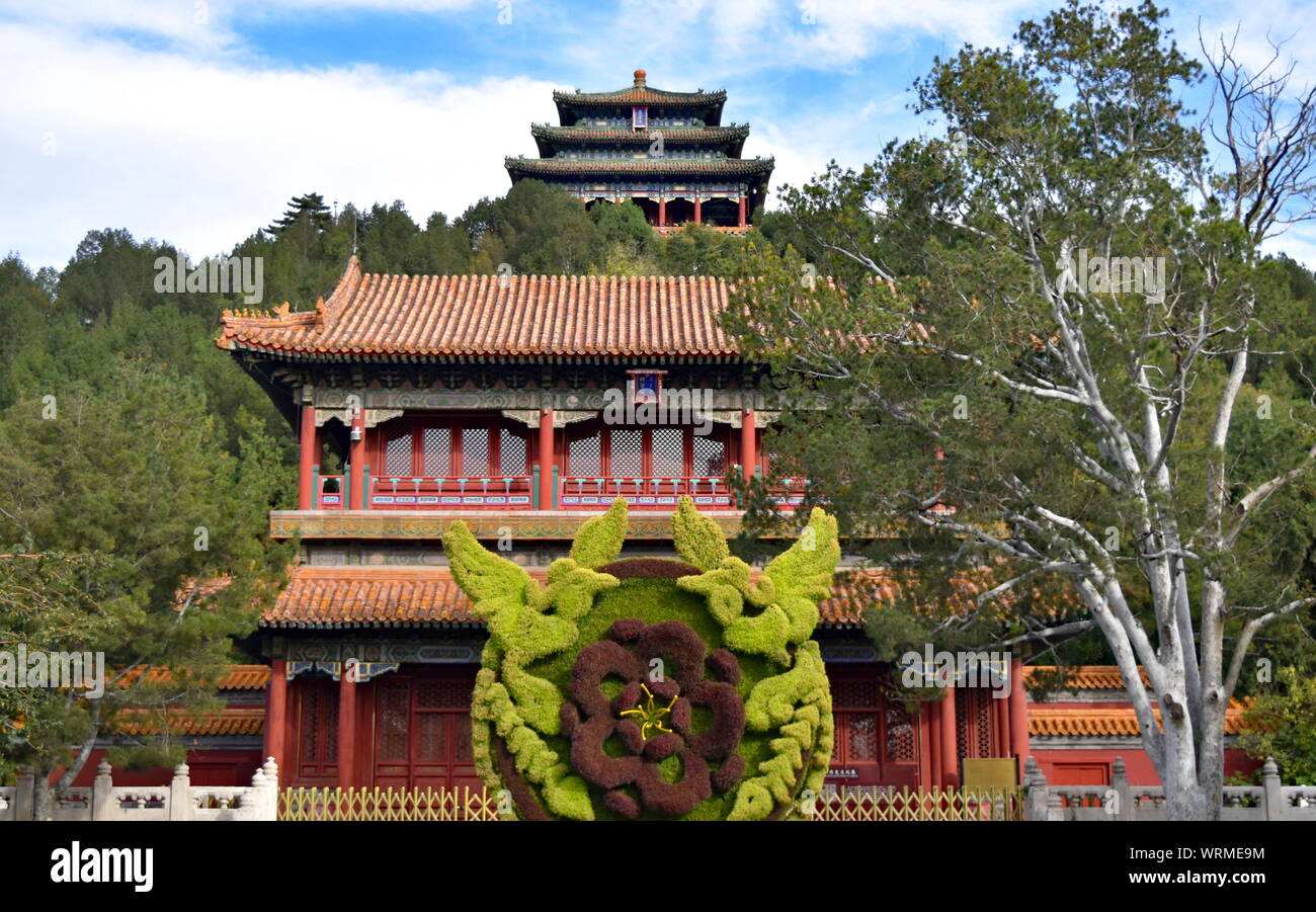 Old Chinese pavilions of Beijing Jingshan hill park created with soil excavated from the mound surrounding Forbidden City palace, China Stock Photo