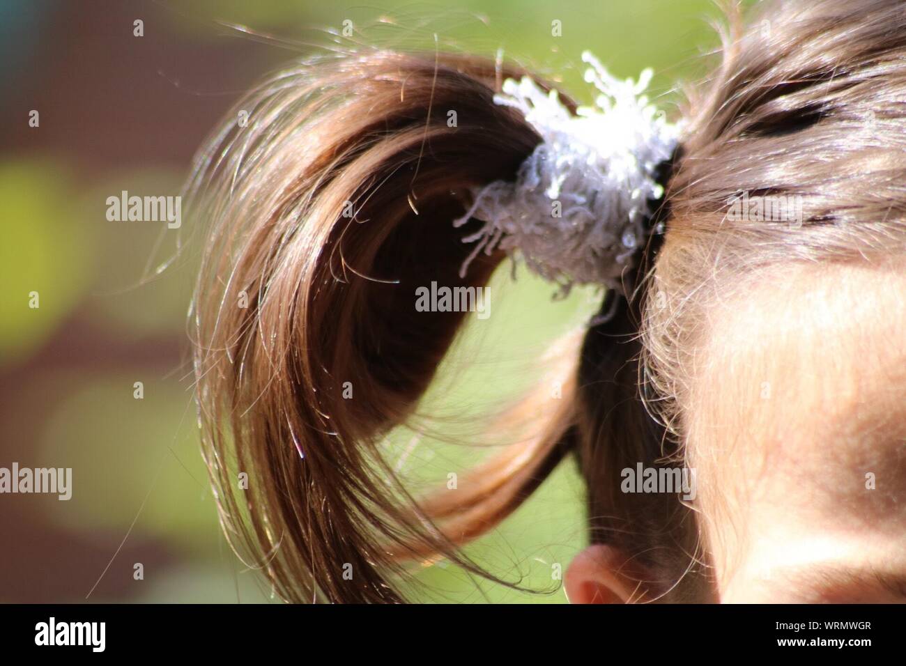 Cropped Image Of Girl With Pigtail Stock Photo