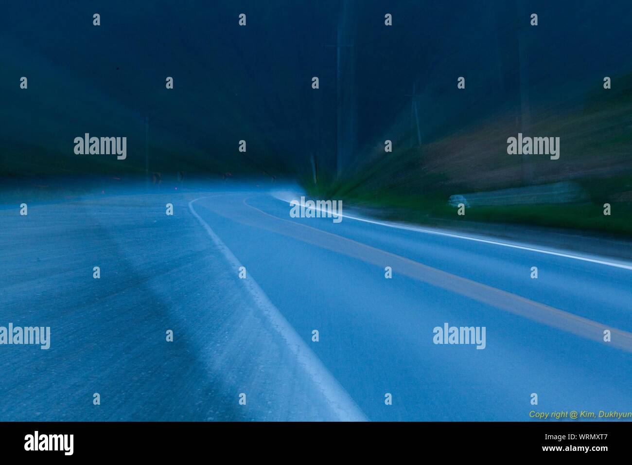 Empty road at night hi-res stock photography and images - Alamy