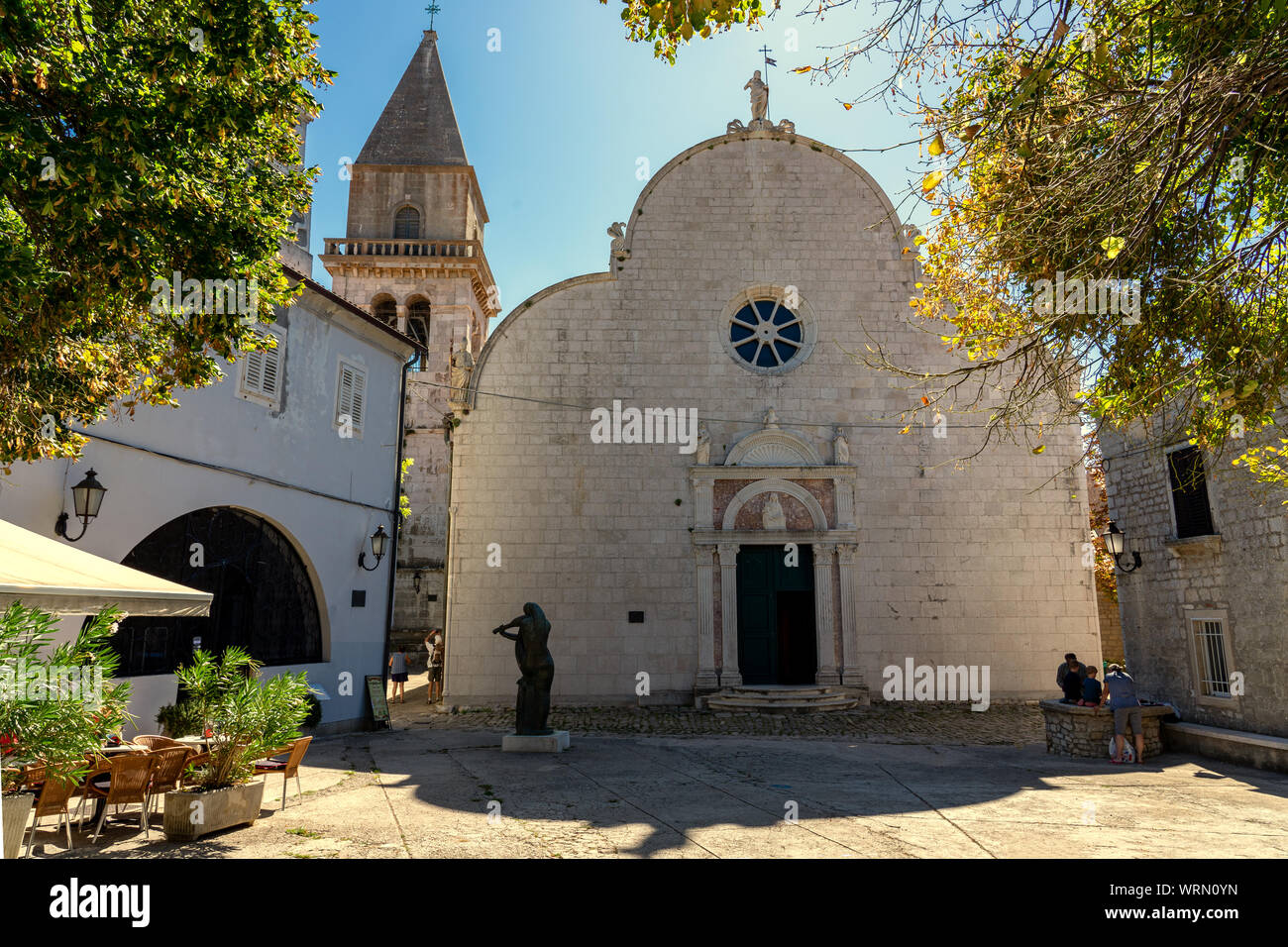 Beautiful historical old town main square of Osor on Cres island with assumption of Mary st. gaudentius church Stock Photo
