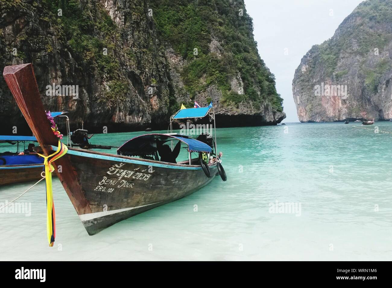 Longtail Boat Moored On Shore At Krabi Province Stock Photo