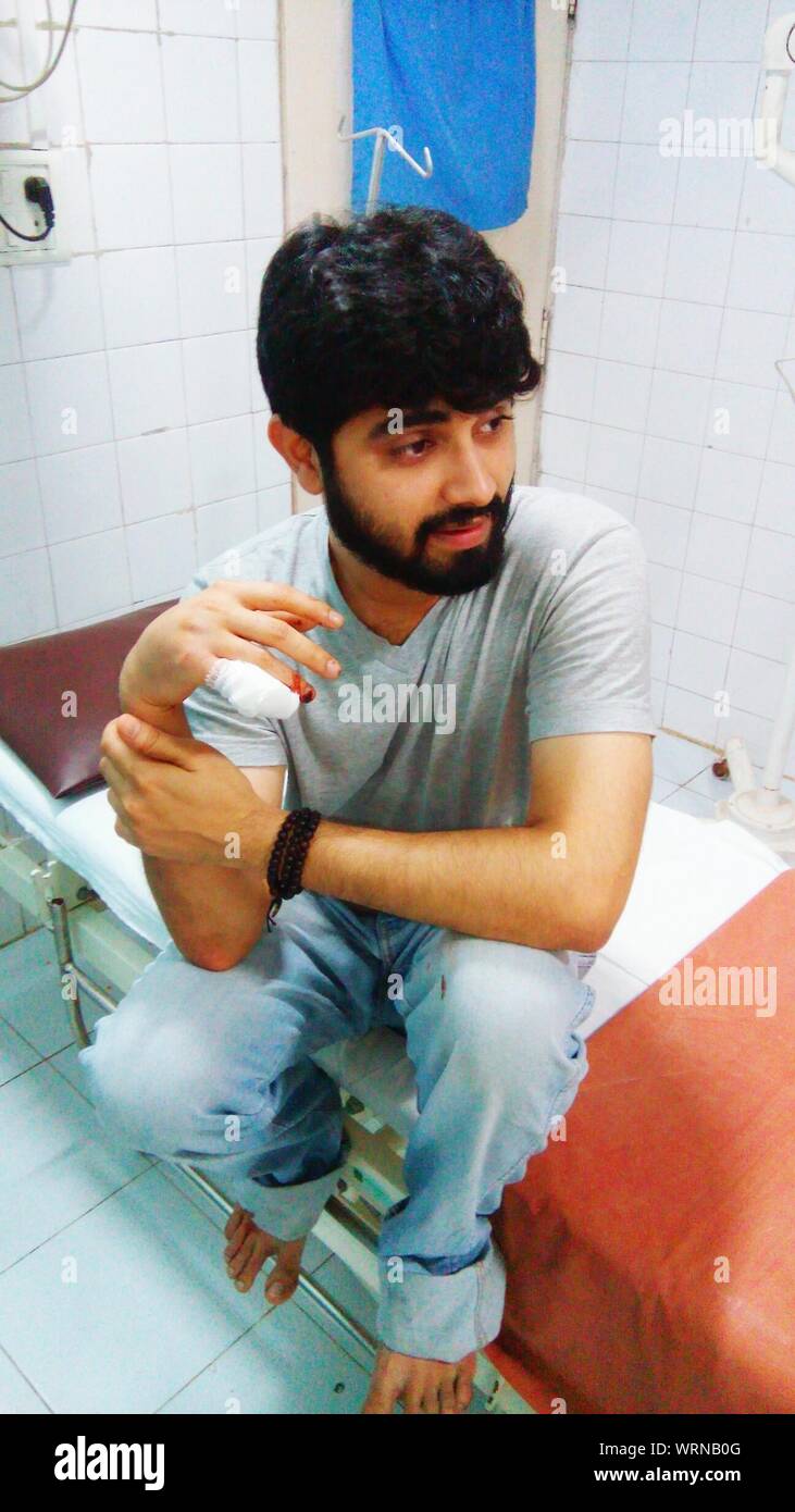 Hospital bed young man hi-res stock photography and images - Alamy