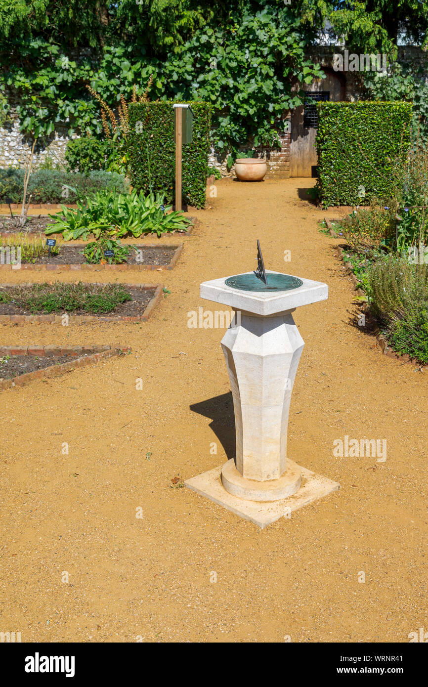Sundial in the Physic Garden, a public botanical herb garden of medicinal plants, in the market town of Petersfield, Hampshire, southern England, UK Stock Photo