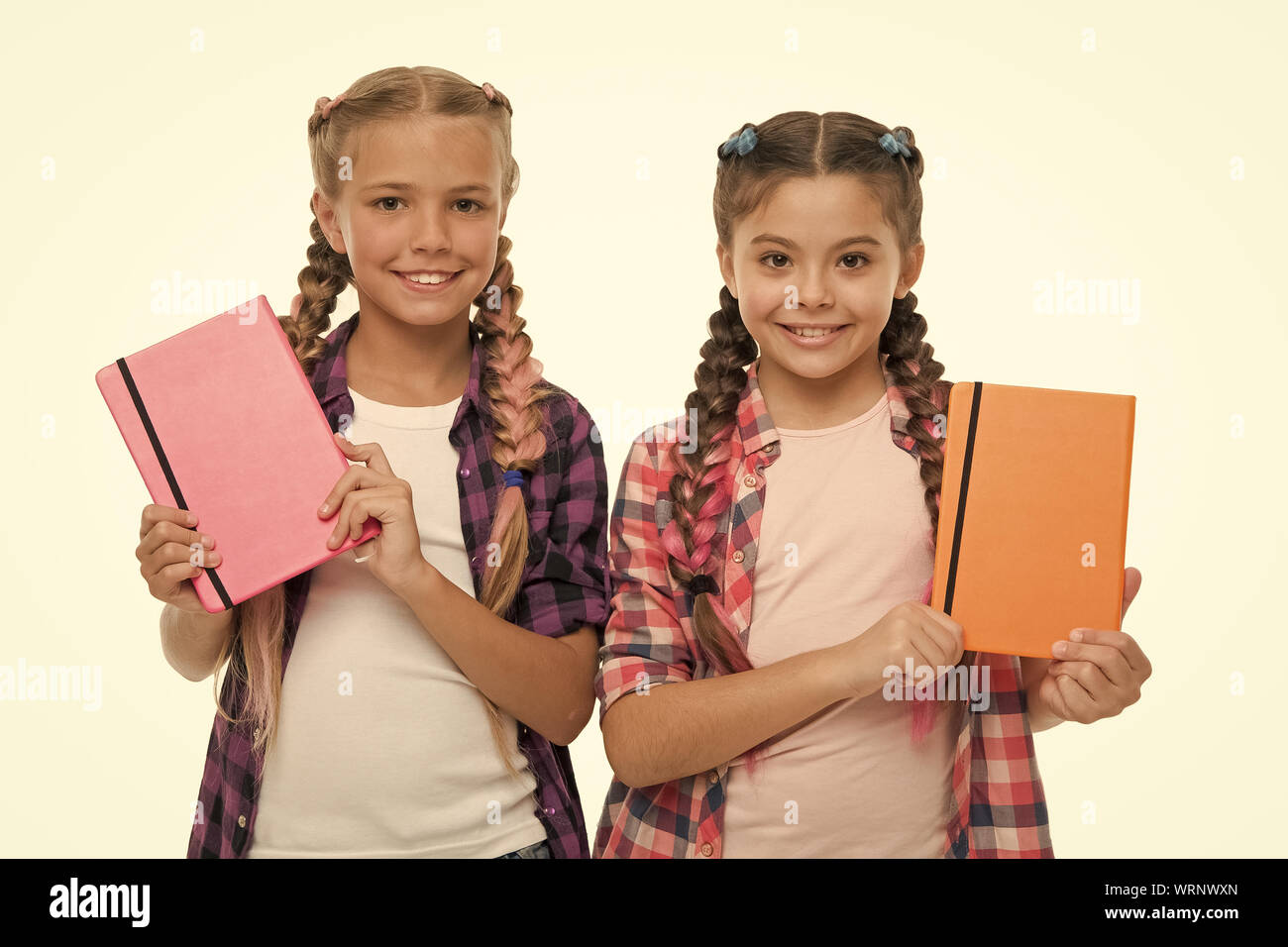 Diary for girls concept. Children cute girls hold notepads or diaries