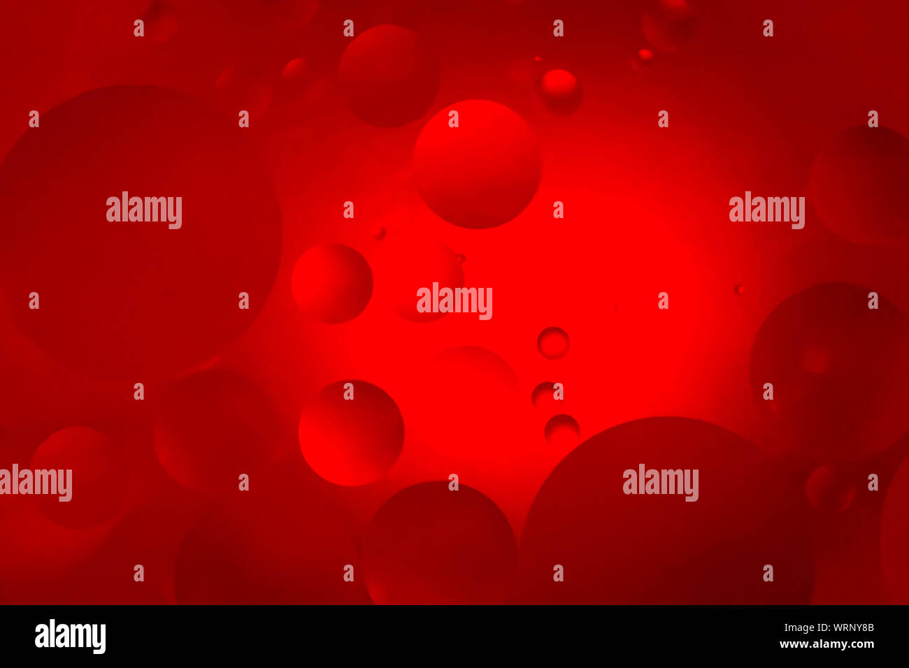 Red liquid bubbles overlay background texture wallpaper design Stock Photo