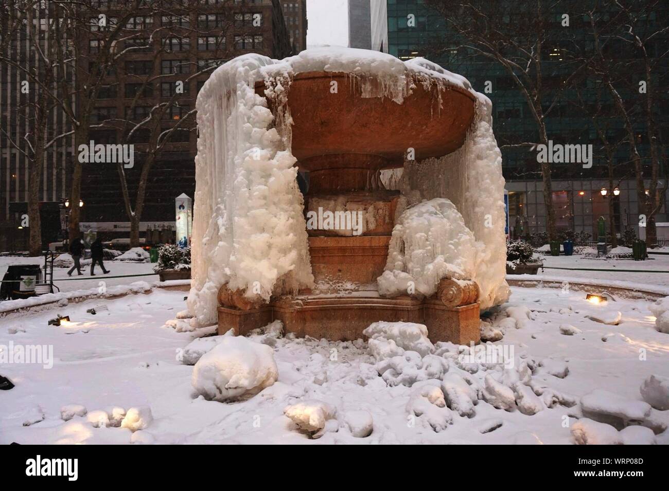 Frozen Fountain In City Stock Photo