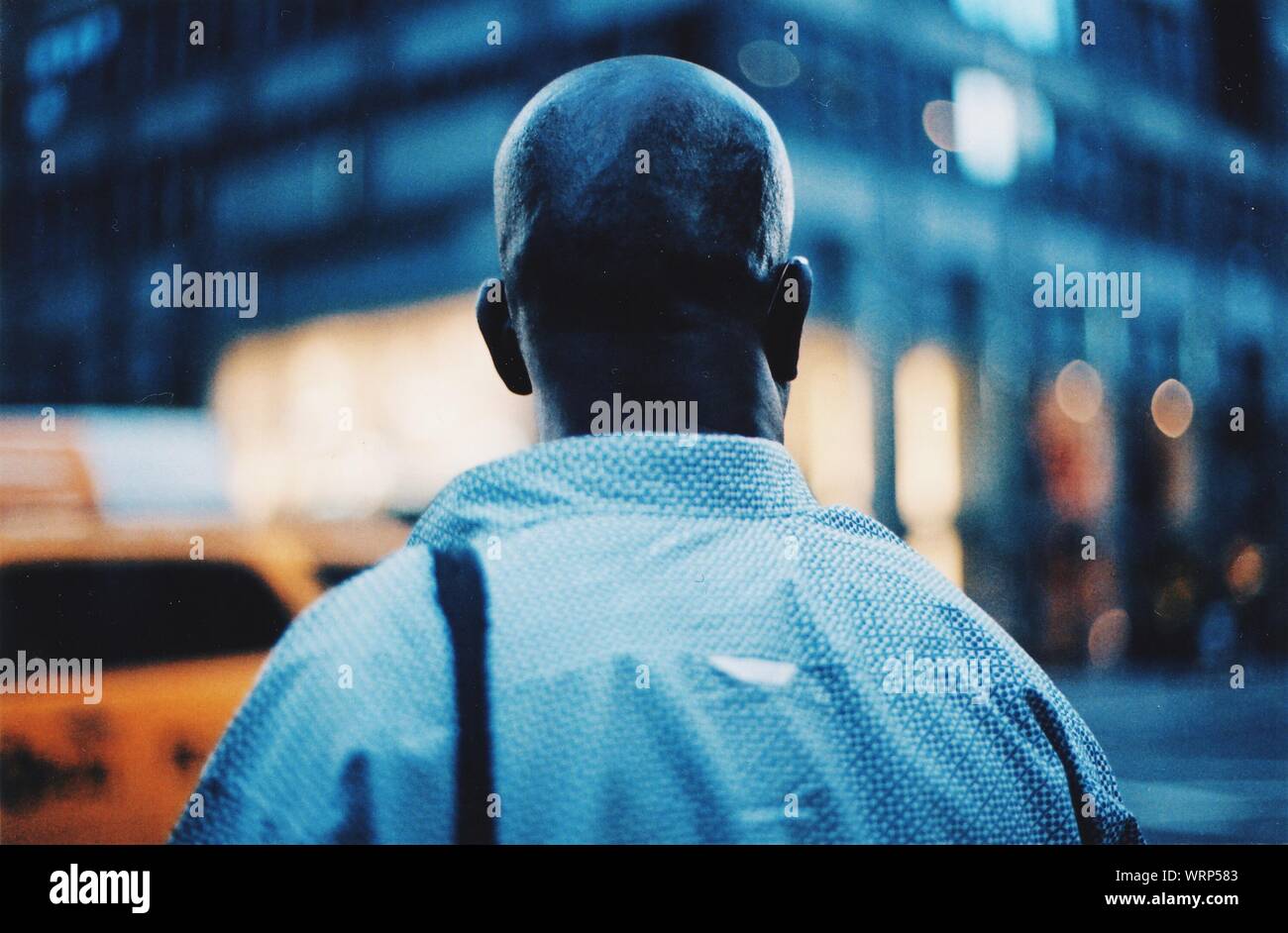 Shaved head man rear view hi-res stock photography and images - Alamy