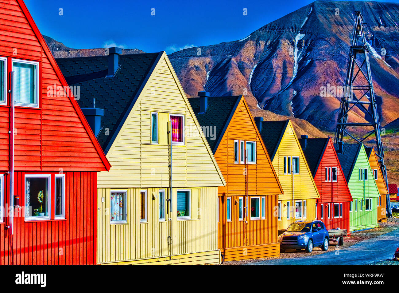 Digitally enhanced row of very colorful homes in Longyearbyen, Svalsbard, Norway. Stock Photo