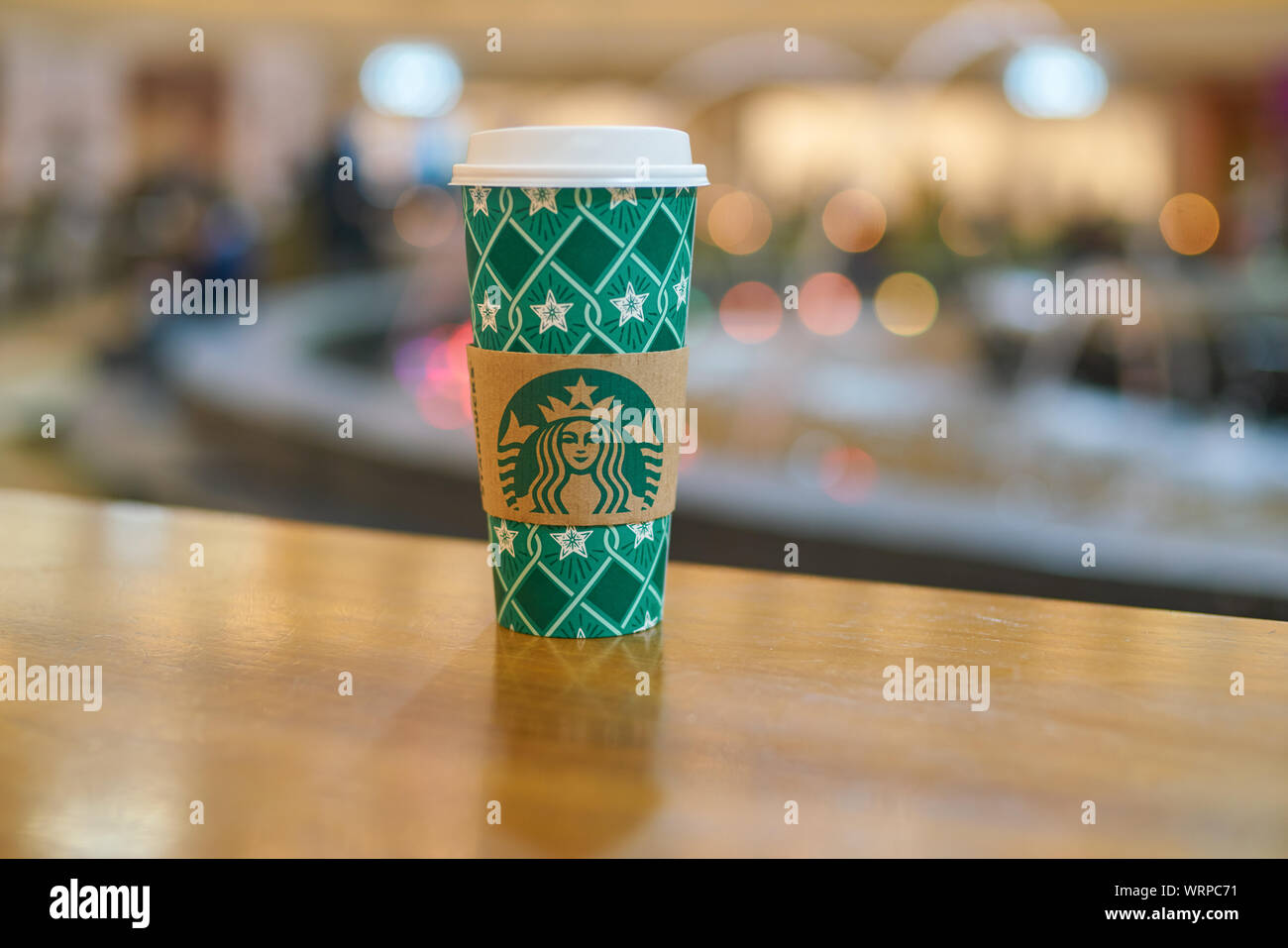 MOSCOW, RUSSIA - CIRCA OCTOBER, 2018: Starbucks paper cup on a table at ...