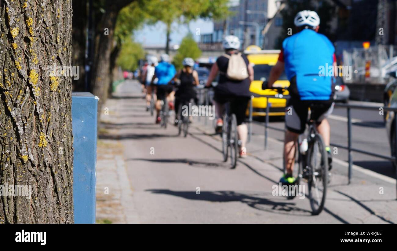 riding bicycle on sidewalk