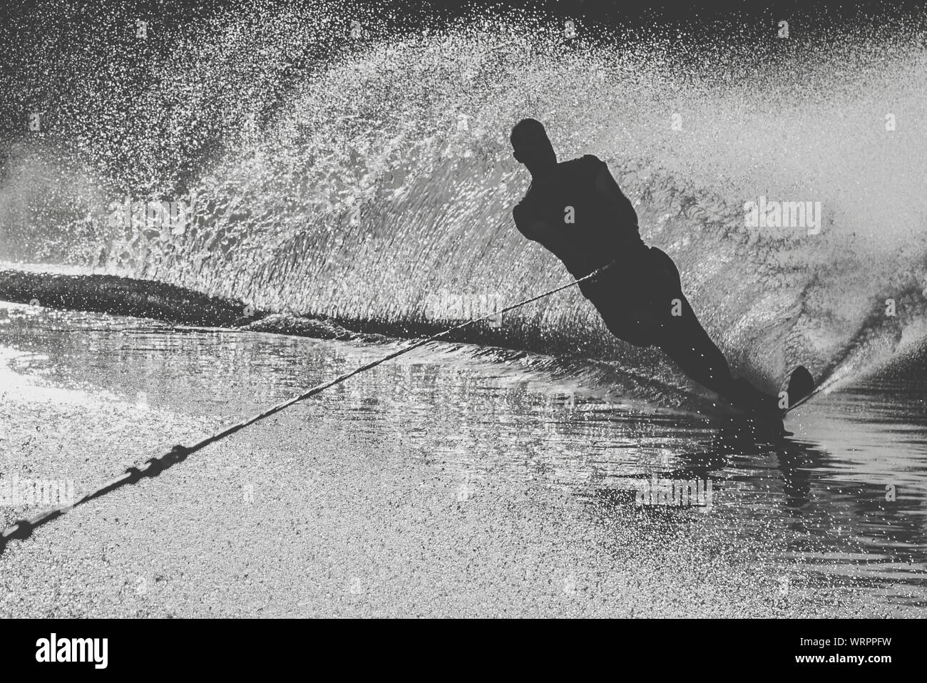 Man Wakeboarding In Sea Stock Photo