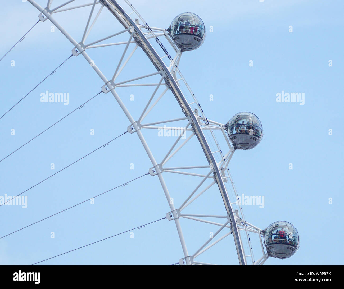 This photo is taken from the Downing Street as the wheel of The London Eye is pictured on a sunny day in  Westminster. Stock Photo