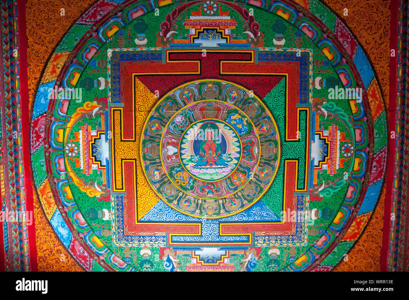 Mandala mural at Ganden Sumtsenling or Sōngzànlín, a Tibetan Buddhist monastery outside Shangri La or Zhongdian, Yunnan, China Stock Photo