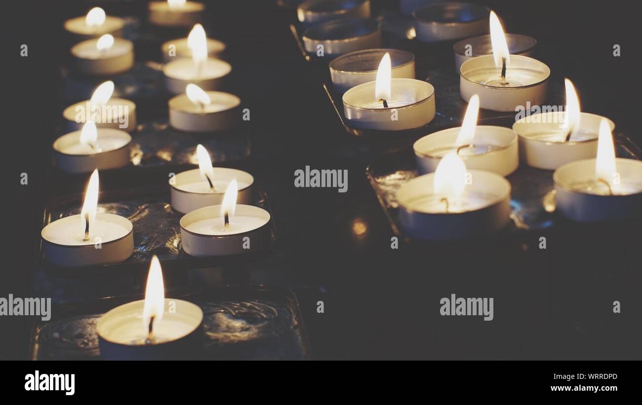 Lit Candles At Altar Stock Photo Alamy