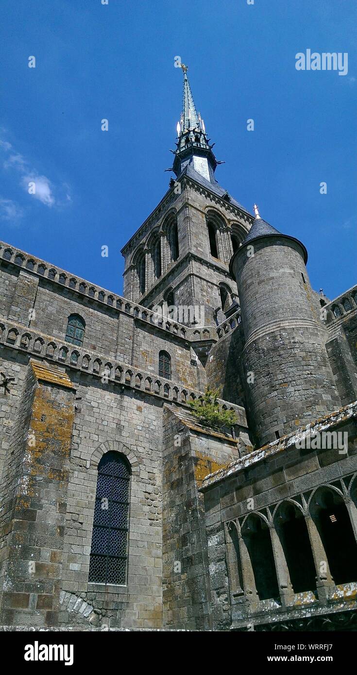 Low Angle View Of Mont Saint Michel Abbey Against Sky Stock Photo