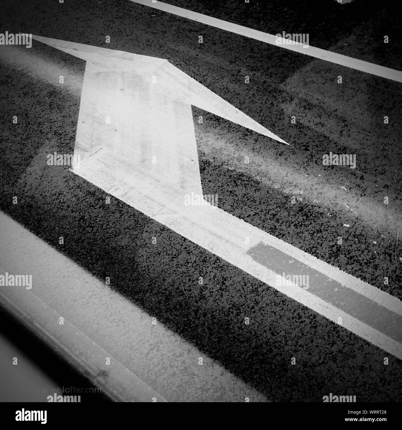 Road marking arrow Black and White Stock Photos & Images - Alamy