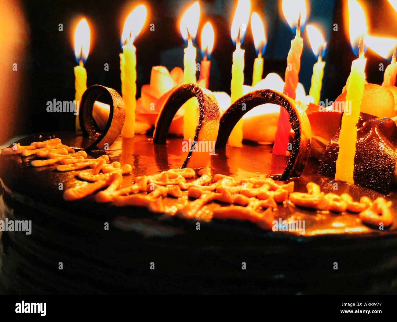 Lit birthday cake candles hires stock photography and images Alamy