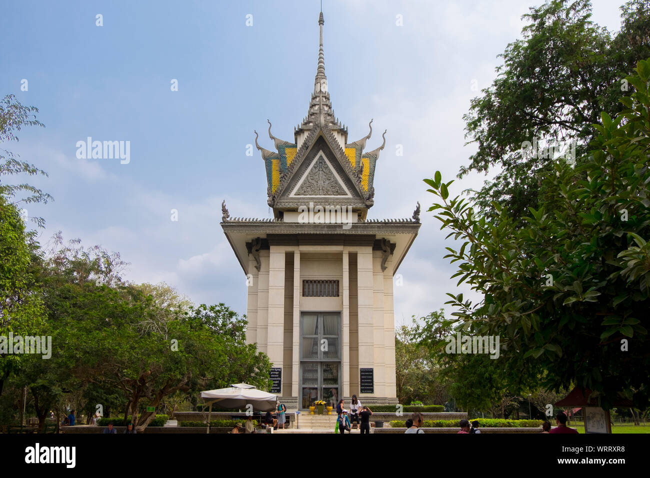 The main memorial Buddhist stupa made of glass and filled with victim's bones at the Choeung Ek Genocidal Center, outiside Phnom Penh, Cambodia. Stock Photo
